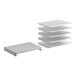 A white Cambro Camshelving® stationary shelf kit with 4 vented shelves and 1 solid shelf.