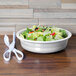 a bowl of salad on a table