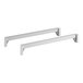 A pair of white metal bars with metal legs.