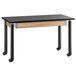 A National Public Seating science lab table with black legs and wheels.