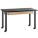 A black National Public Seating science lab table with wood top and metal legs on wheels.