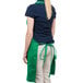 a person wearing a green apron