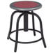 A National Public Seating lab stool with a burgundy steel seat and black metal base.