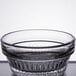 A close up of a Libbey Winchester clear glass ramekin with a rim.