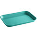 A green fiberglass market tray with handles.