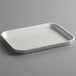 A white rectangular Cambro market tray.