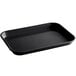 A black rectangular fiberglass market tray with handles.