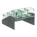 A Cal-Mil gray oak wood display stand with glass containers inside.