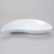 A white bowl with a curved edge.