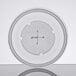 A white plastic lid with a cross on it.
