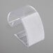 A clear plastic Snap Drape table skirt clip with a white hook and loop attachment.