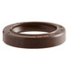 A brown rubber circular support ring with a hole in it.