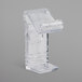 A clear plastic Snap Drape C skirt clip.