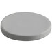 A gray round cap with a white circle inside.