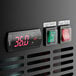 A close-up of the digital display on an Avantco UDD-3-HC beer dispenser with red numbers.