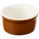 A brown and white Tuxton china ramekin.