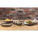 A group of GET metal rectangular wire baskets with food on a table.