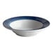 A close-up of a white porcelain bowl with a steel blue band.