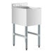 A white sink with metal legs.