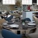 A Villeroy & Boch black shale porcelain plate on a table.