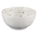 a white bowl with speckled specks