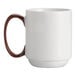 A close-up of a Libbey white porcelain mug with a brown handle.