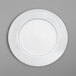 a white plate with a circular pattern
