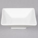 A CAC Citysquare bright white square porcelain bowl.