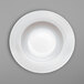 A white Villeroy & Boch bone porcelain plate with a white rim.