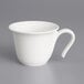 A white Villeroy & Boch porcelain mug with a handle.