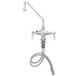 A close-up of a T&S chrome deck-mounted pantry faucet with a hose attached.