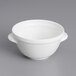 A close up of a Villeroy & Boch white bowl with a handle.