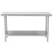 A stainless steel Advance Tabco work table with a shelf.