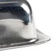 An American Metalcraft stainless steel square sauce cup on a counter.