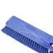 A blue Carlisle Sparta Omni Sweep push broom head with bristles.