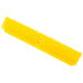 A yellow Carlisle Sparta Omni Sweep push broom head with bristles.