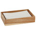 A wooden box with a stack of white napkins inside.
