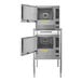 A close-up of two Cleveland SteamChef ovens with open doors.