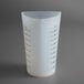A white Tablecraft flexible silicone measuring cup with black lines on the sides.