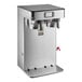 A black and silver stainless steel Bunn commercial coffee machine with two dispensers.