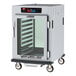 A white Metro C5 pass-through heated holding and proofing cabinet with clear glass doors.