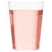 A Fineline clear plastic tumbler filled with pink liquid.