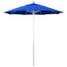 A California Umbrella ALTO round outdoor umbrella with a blue Sunbrella canopy on a silver pole.