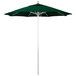 A green California Umbrella on a white pole.