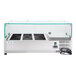 An Avantco refrigerated countertop prep rail with a glass top.