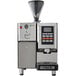 a machine with a screen and a cup on it
