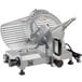 A Backyard Pro manual meat slicer with a metal blade.