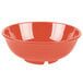 A close-up of a GET Rio Orange melamine bowl.