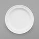 An Elite Global Solutions white melamine plate.