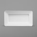 a white rectangular plate on a gray background